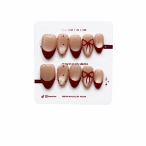 Classic Bow French Press-On Nails — Medium Almond, Ruby Tip — detail view