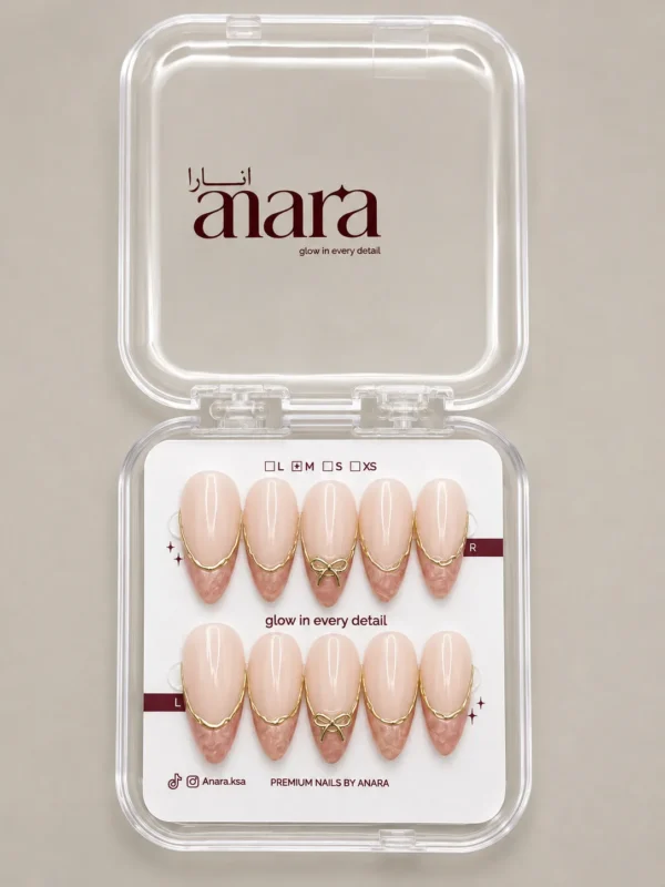 Nude Gold French Bow press-on nails, medium almond: ready to wear