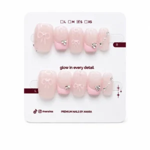 Pink Ribbon Pearl Press-On Nails — Short Squoval, Bow and Pearl — ten reusable nails on the ANARA card