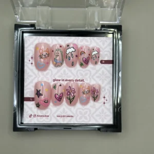 Doodle Day Press-On Nails — Long Almond, Hand-Drawn Charms — twenty-four nails in the ANARA box