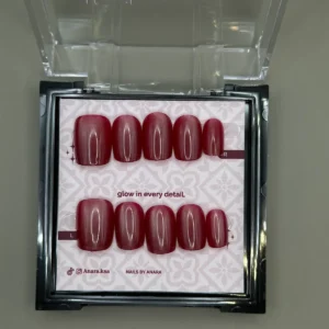 Raspberry Glaze Press-On Nails — Medium Square, Cat-Eye — twenty-four nails in the ANARA box